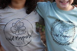 Youth Wild Magnolia Mystery Color Logo Tee.