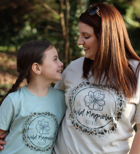 Adult Wild Magnolia Mystery Color Logo Tee.